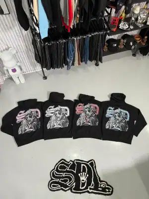 Stylish customized hoodies with graphic print designs, perfect for streetwear fashion.